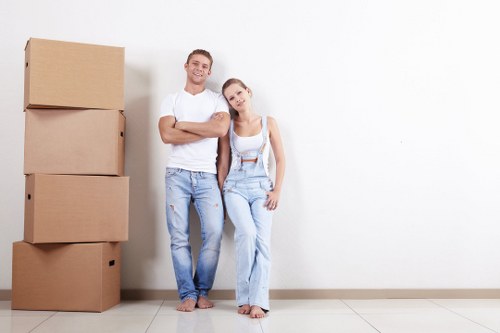 Removal van and packed boxes representing a Luton move quote