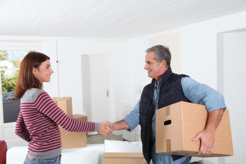 Packed office boxes and furniture ready for relocation