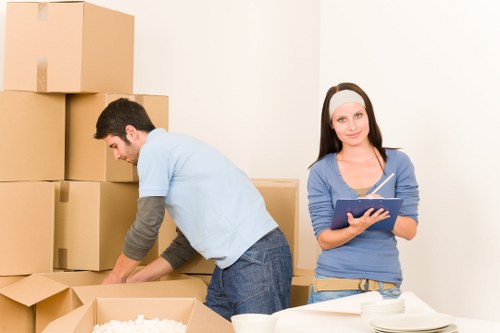 Professional removal team loading belongings for a Luton house move