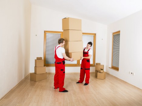 Unpacking service helping a family settle into a new Luton home