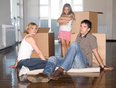Luton moving team handling boxes and household items
